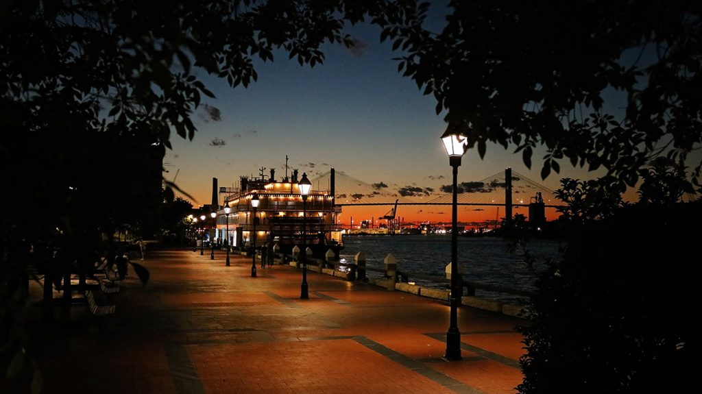 Dark orange sunset on River Street Savannah GA