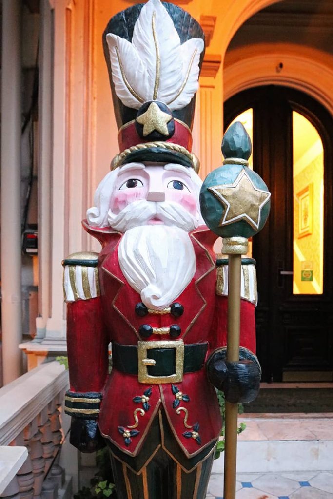 Close-up of an oversized nutcracker guarding the door of the Hamilton-Turner Inn in Savannah