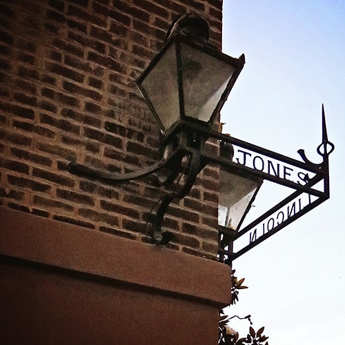 Silhouette of a metal street sign on Jones Street in Savannah Georgia.