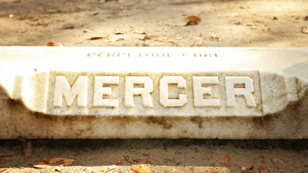 Entrance to the Mercer Family Plot in Bonaventure Cemetery with "MERCER" and "perpetual care" carved in stone