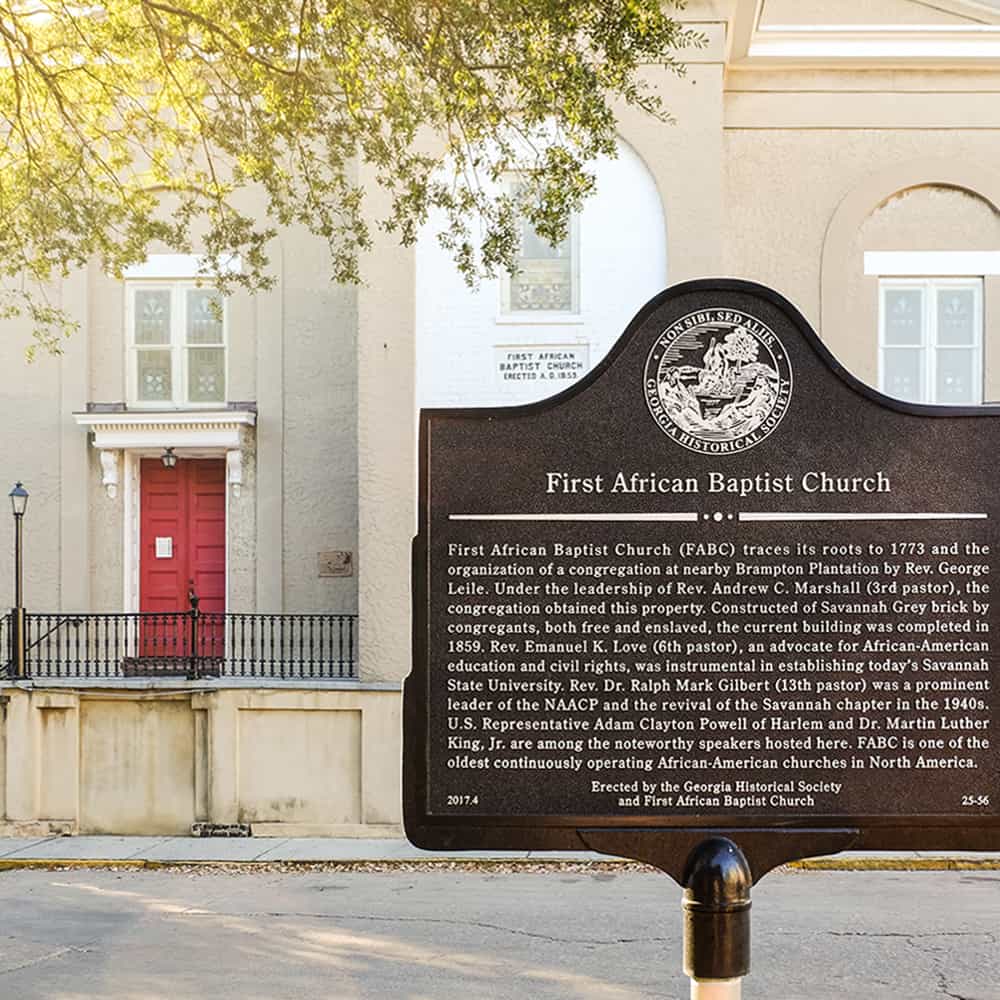 Historic Marker for First African Baptist Church with the church's red front door showing in the background