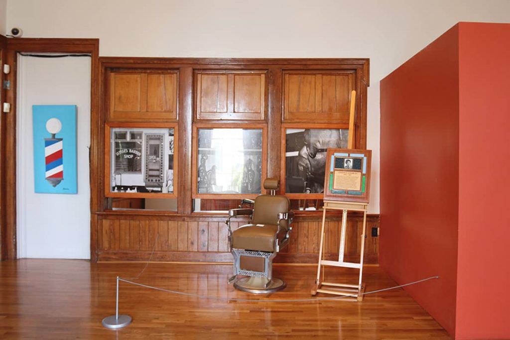 Display of an old-timey barber shop in The Beach Institute 