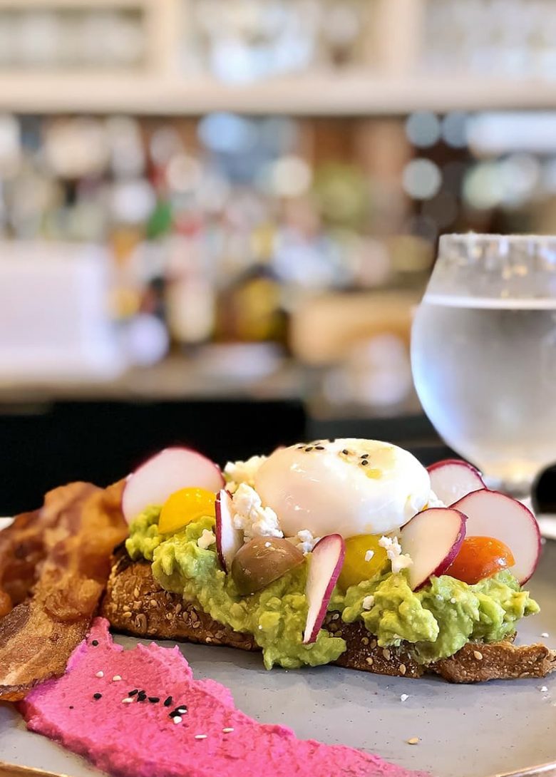 The avocado smash might be the best breakfast in Savannah, with bacon, beet spread, and toast covered in avocado, eggs, beets, and tomato