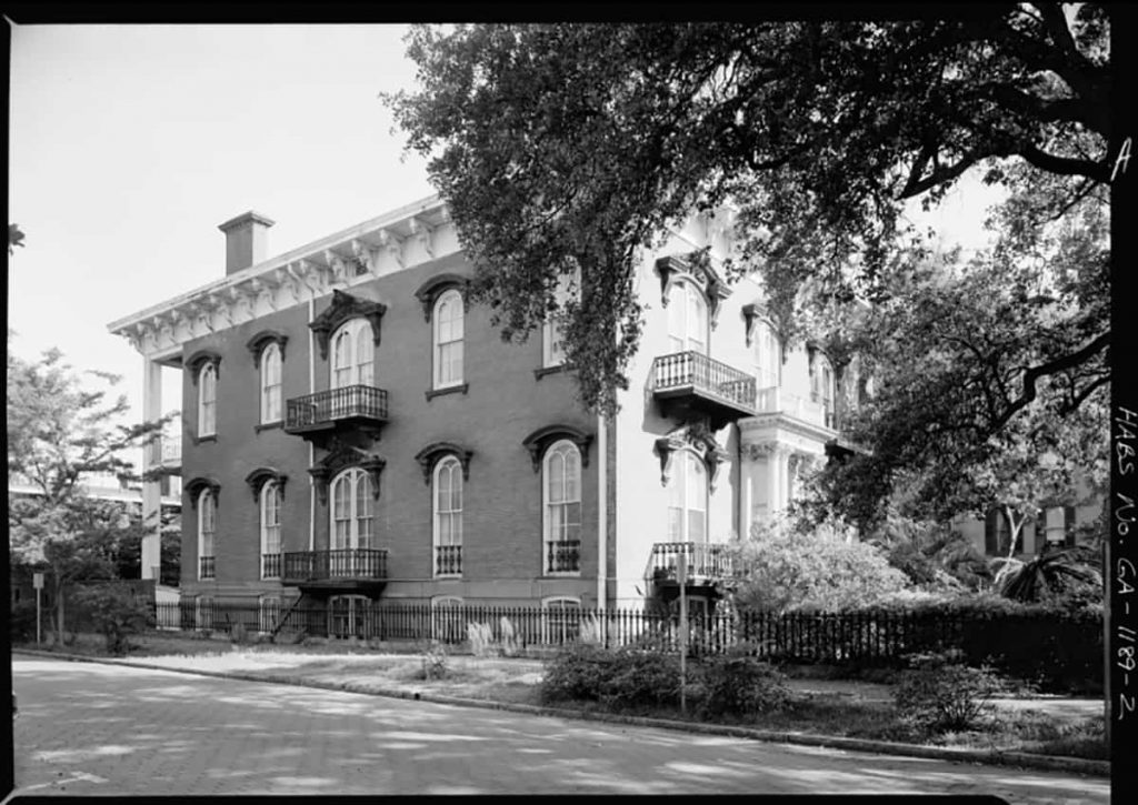 Historic B&W image of the south-facing façade of the Mercer Williams House