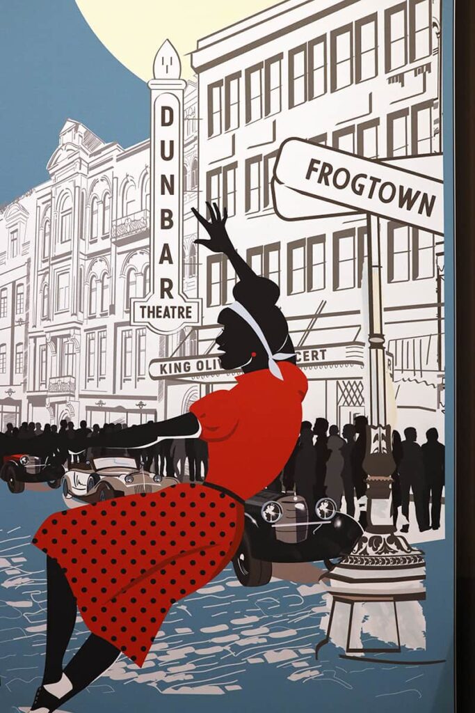 B&W illustration of historic Frogtown in Savannah with a woman in the foreground dancing in front of King Olivers while wearing a red dress