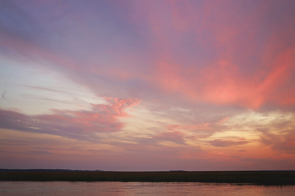 Pink, orange, and lavender sunset along the Back River of Tybee Island, Georgia