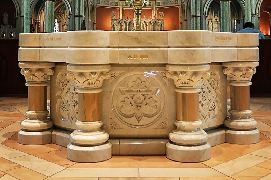 Octagonal-shaped baptismal font inside the Cathedral Basilica of St. John the Baptist. It is carved out of 8000 pounds of Carrara marble