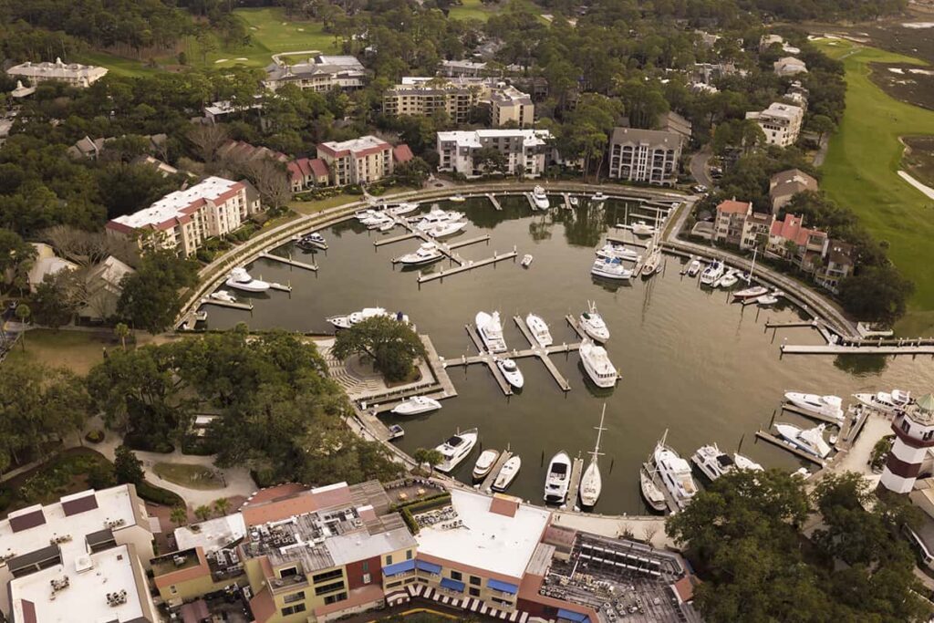 Aerial view of Harbour Town Marina at sunset, one of the most popular Hilton Head marinas