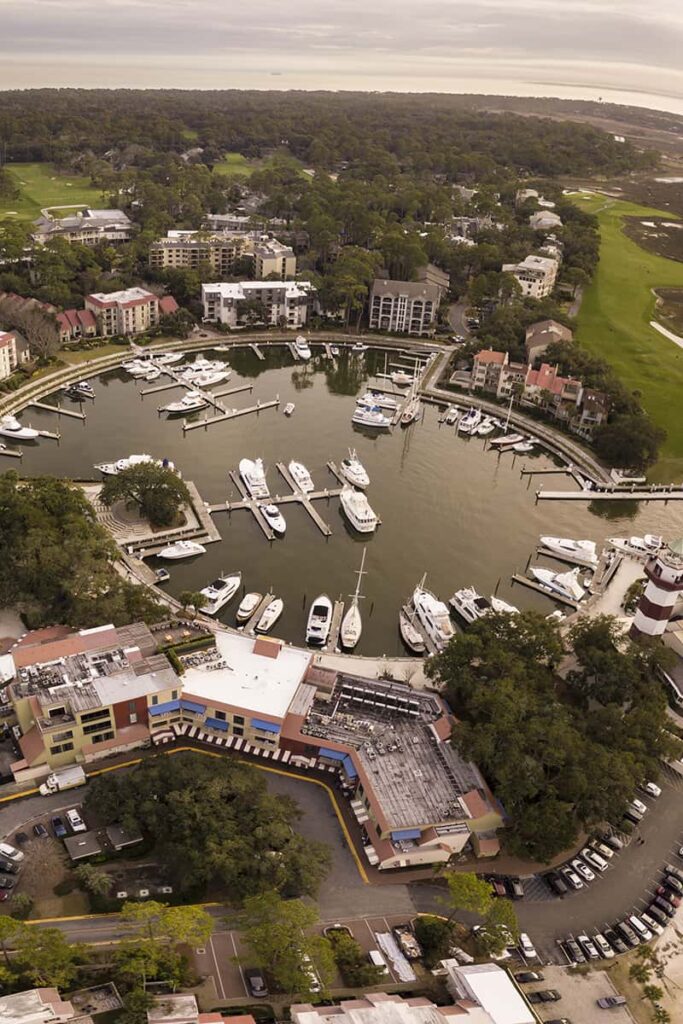 Aerial view of one of the most popular Hilton Head marinas at sunset with the Calibogue Sound visible in the distance