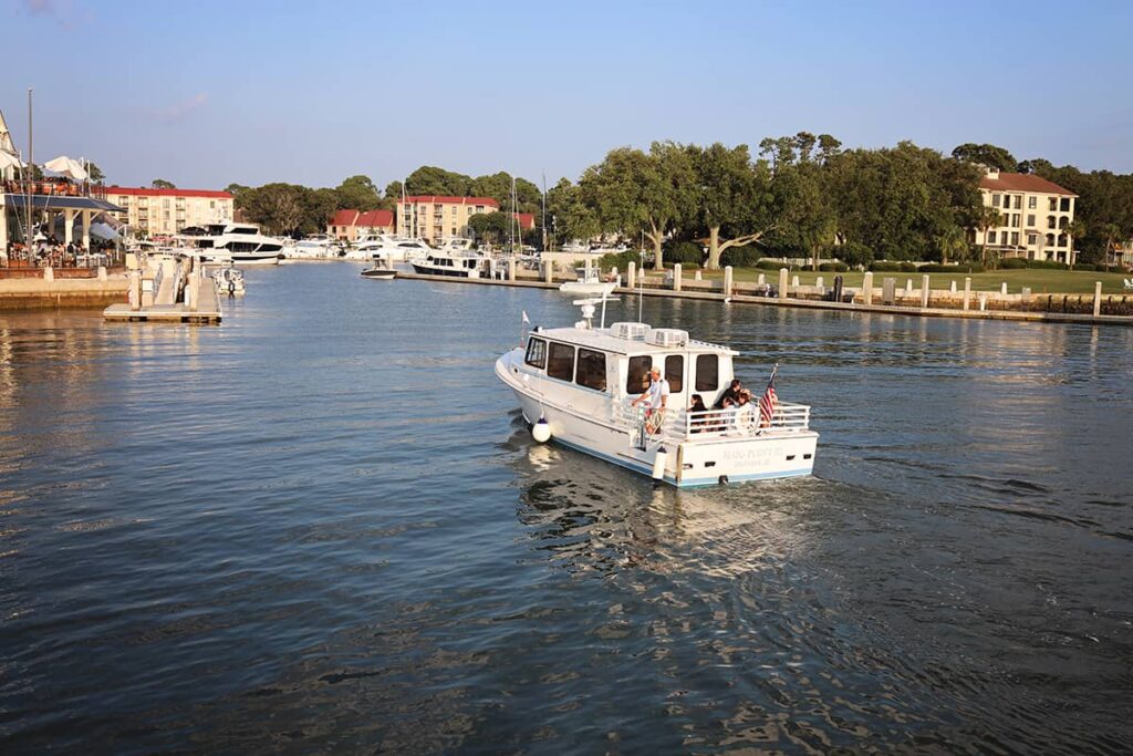 The Haig Point III cruises into Harbour Town Marina in Hilton Head with a full load of passengers after one of their daytime boat tours