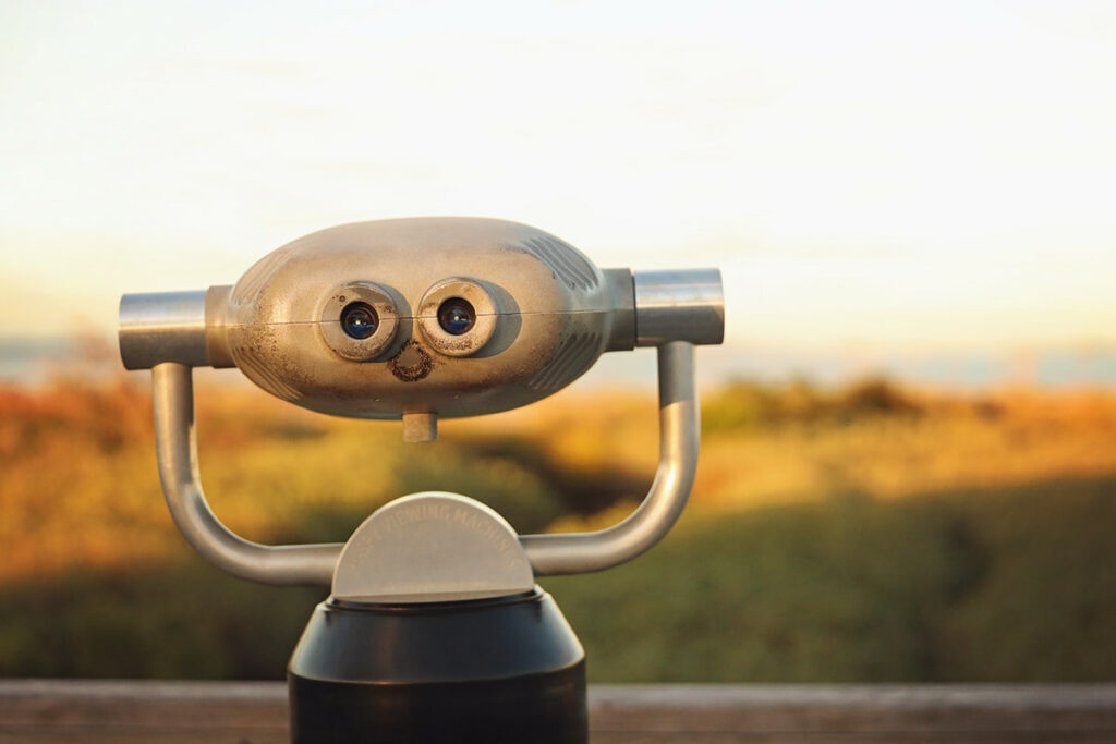 This pareidolia-style image of a Hi Spy Viewfinder resembles a cartoon metal robot overseeing the sunset on Mitchelville Beach