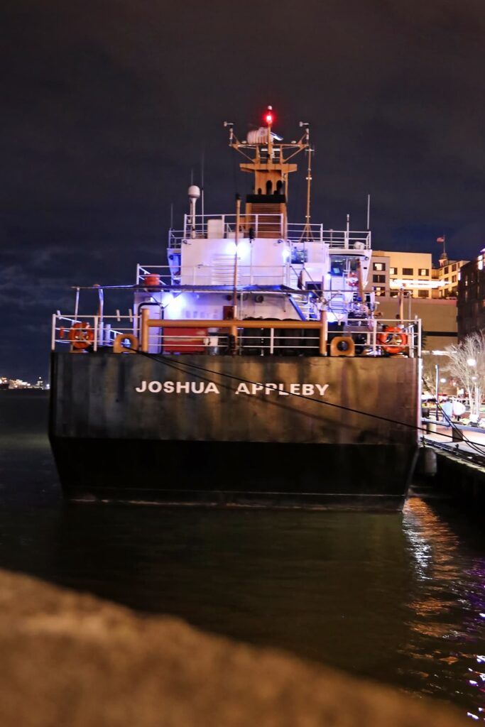 View of the stern of the U.S. Coast Guard's Joshua Appleby docked on River Street in Savannah